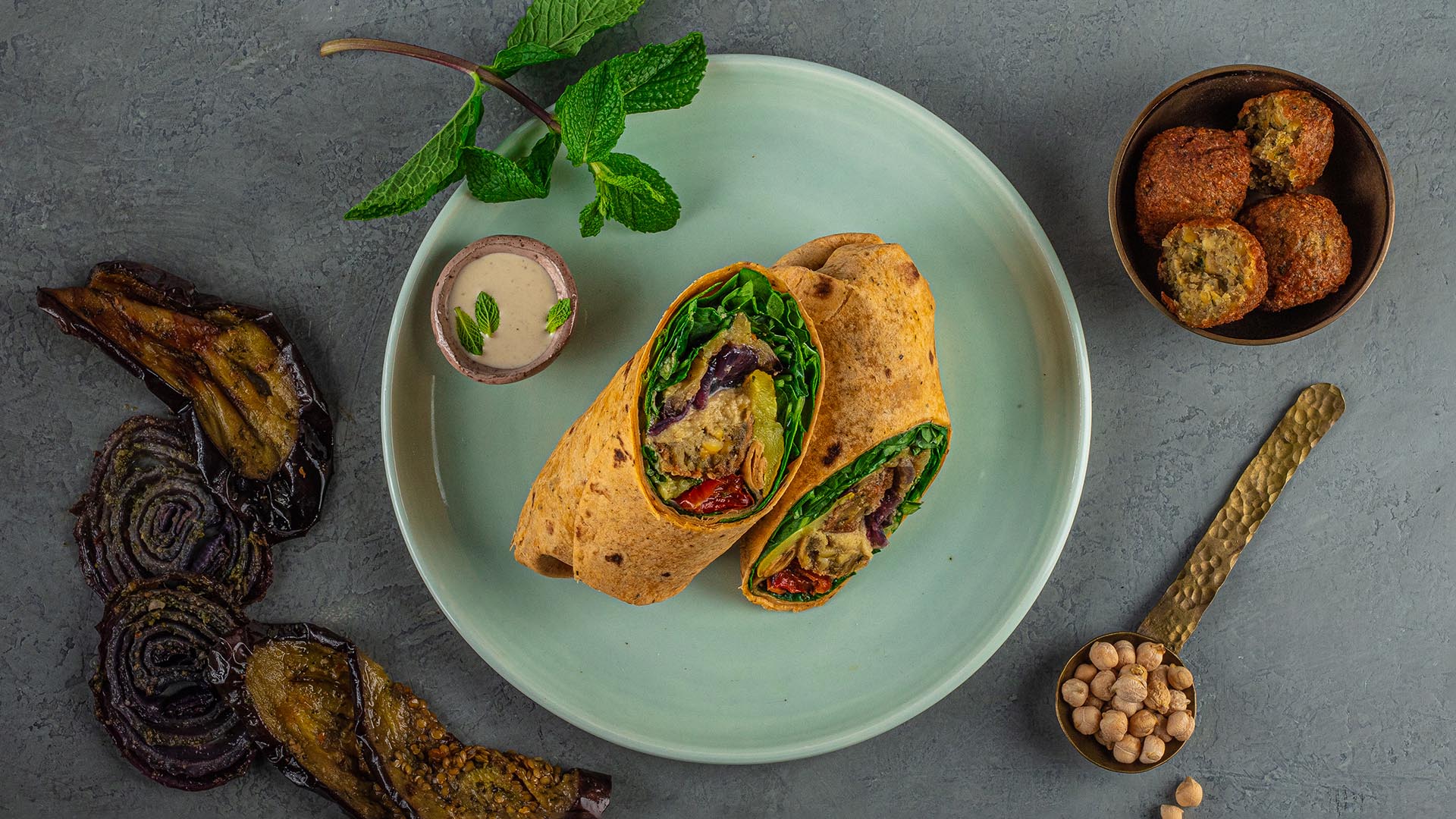 falafel vegetable whole wheat wrap on plate