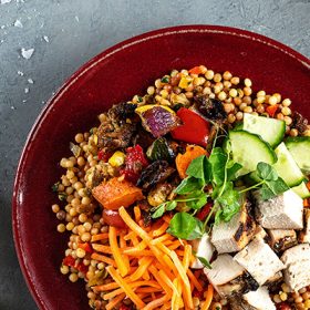 moroccan chicken and couscous bowl served