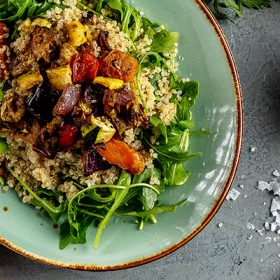 roasted vegetable quinoa bowl on plate